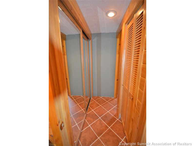 78 Guller Road, Unit 212 Frisco, CO 80443 - Photo 20 of 23 Storage. Looking for a condo with great storage? This is it! Main level hallway with linen closet on the right & large closet with sliding mirrored doors on left!