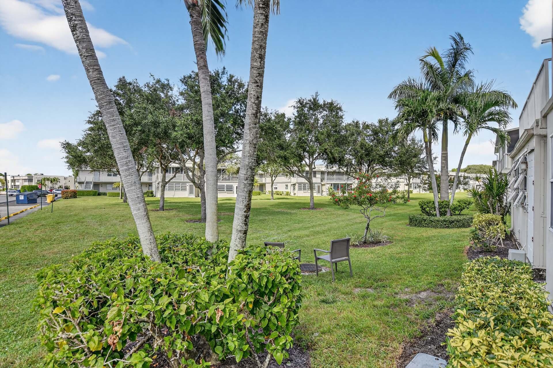 360 Flanders Drive, Unit H Delray Beach, FL 33484 - Photo 26 of 65 a view of a garden with plants