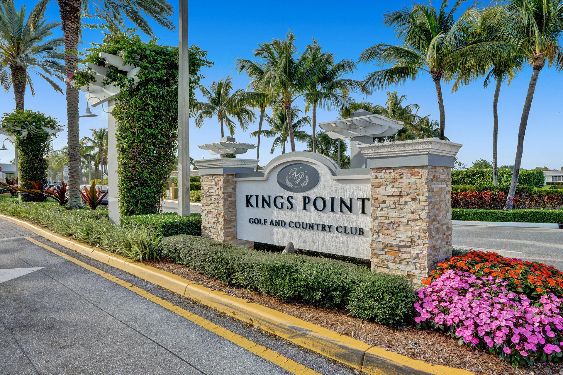 360 Flanders Drive, Unit H Delray Beach, FL 33484 - Photo 29 of 65 a sign on the side of a road