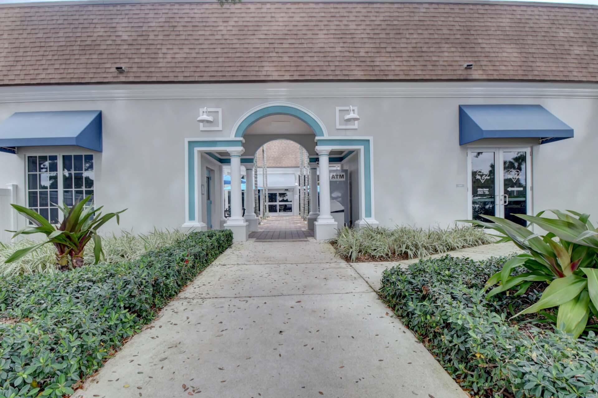 360 Flanders Drive, Unit H Delray Beach, FL 33484 - Photo 37 of 65 a front view of a house with garden
