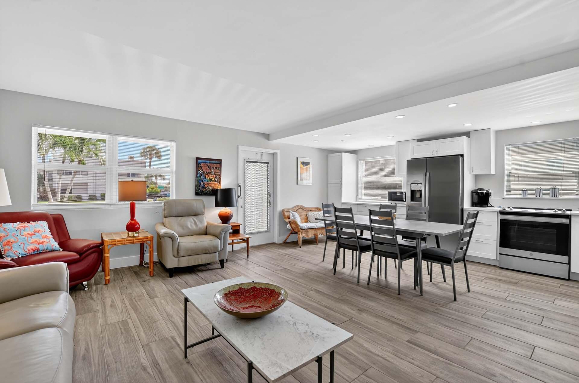 360 Flanders Drive, Unit H Delray Beach, FL 33484 - Photo 5 of 65 a living room with furniture and a wooden floor