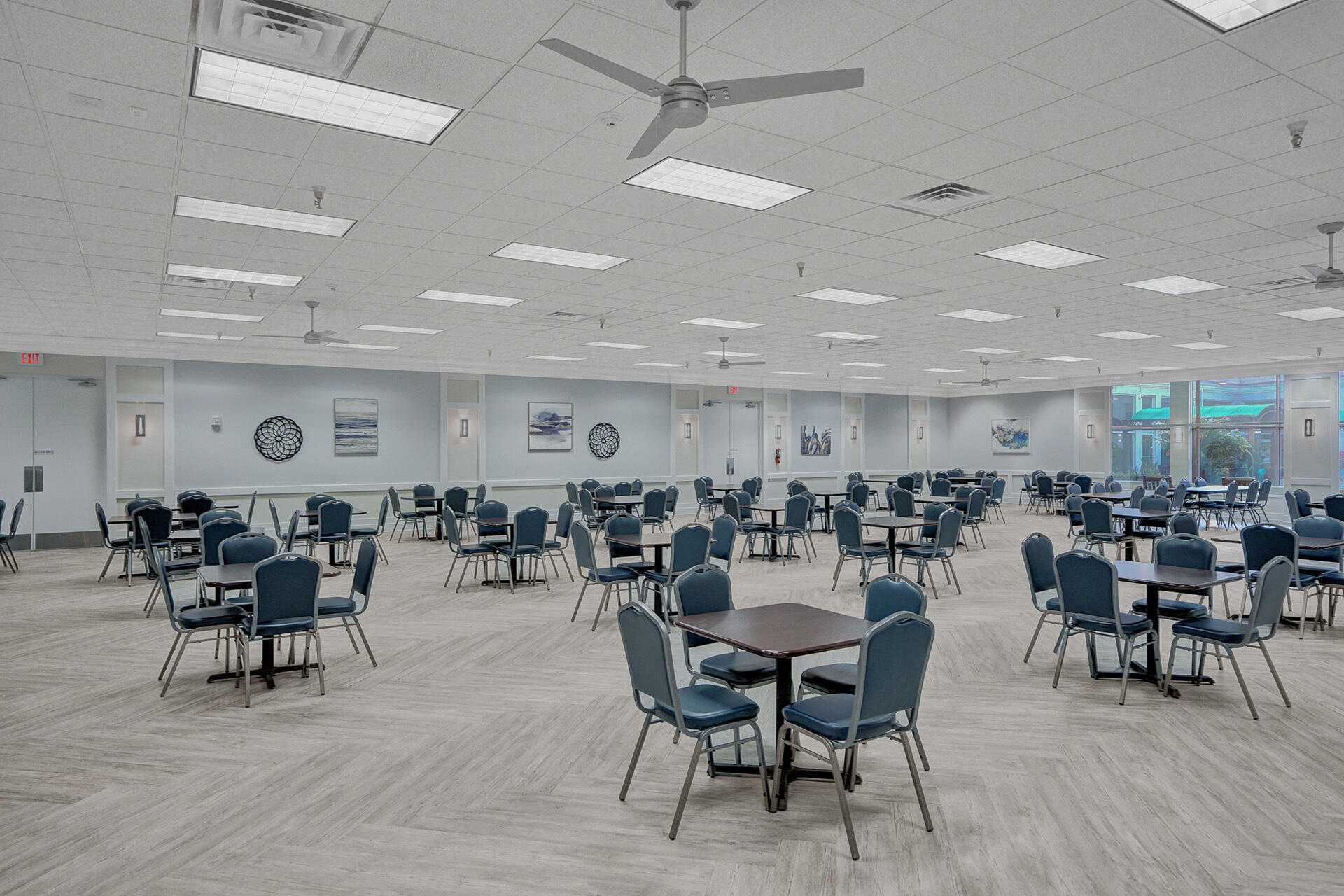 360 Flanders Drive, Unit H Delray Beach, FL 33484 - Photo 58 of 65 a group of people sitting at tables in a room