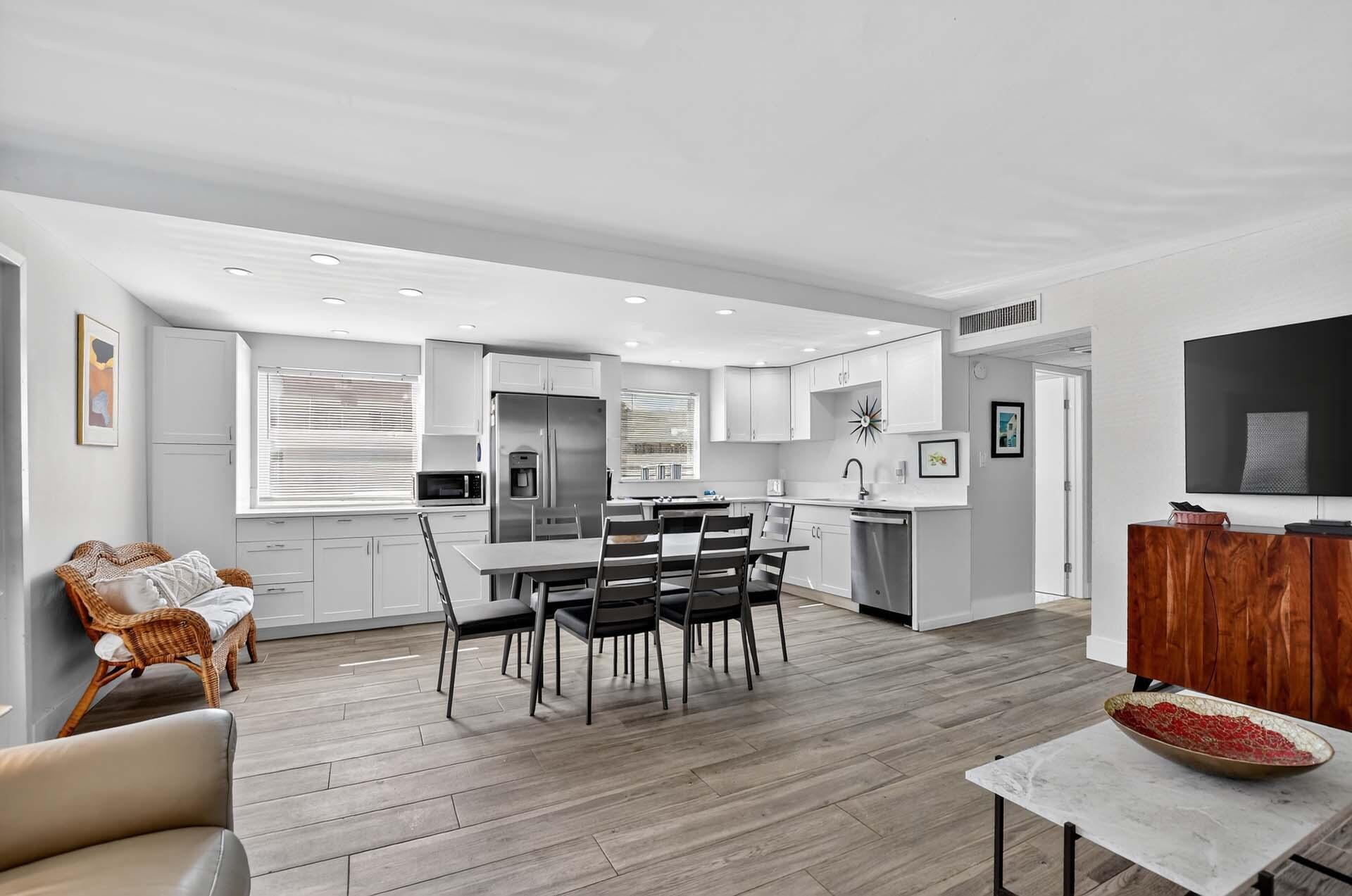360 Flanders Drive, Unit H Delray Beach, FL 33484 - Photo 6 of 65 a view of a dining room with furniture and wooden floor