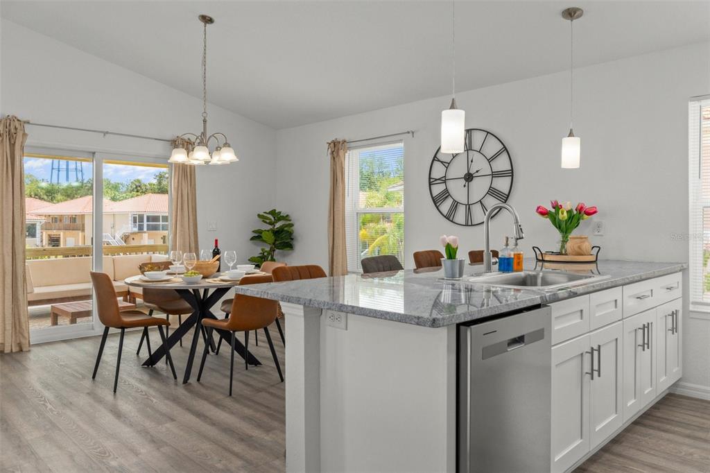 10234 West Middleburg Loop, Unit 152 Homosassa, FL 34448 - Photo 12 of 28 a view of a dining area with furniture window and outside view