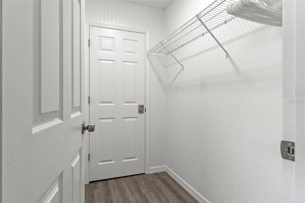 10234 West Middleburg Loop, Unit 152 Homosassa, FL 34448 - Photo 17 of 28 a view of a room with racks on the wall