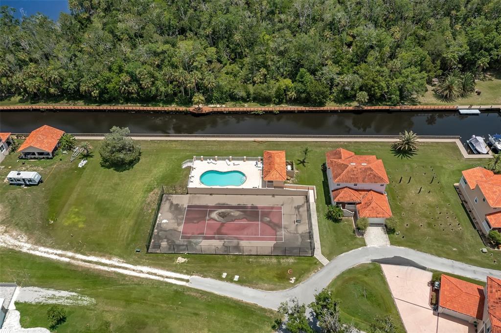 10234 West Middleburg Loop, Unit 152 Homosassa, FL 34448 - Photo 25 of 28 an aerial view of a houses with a lake view