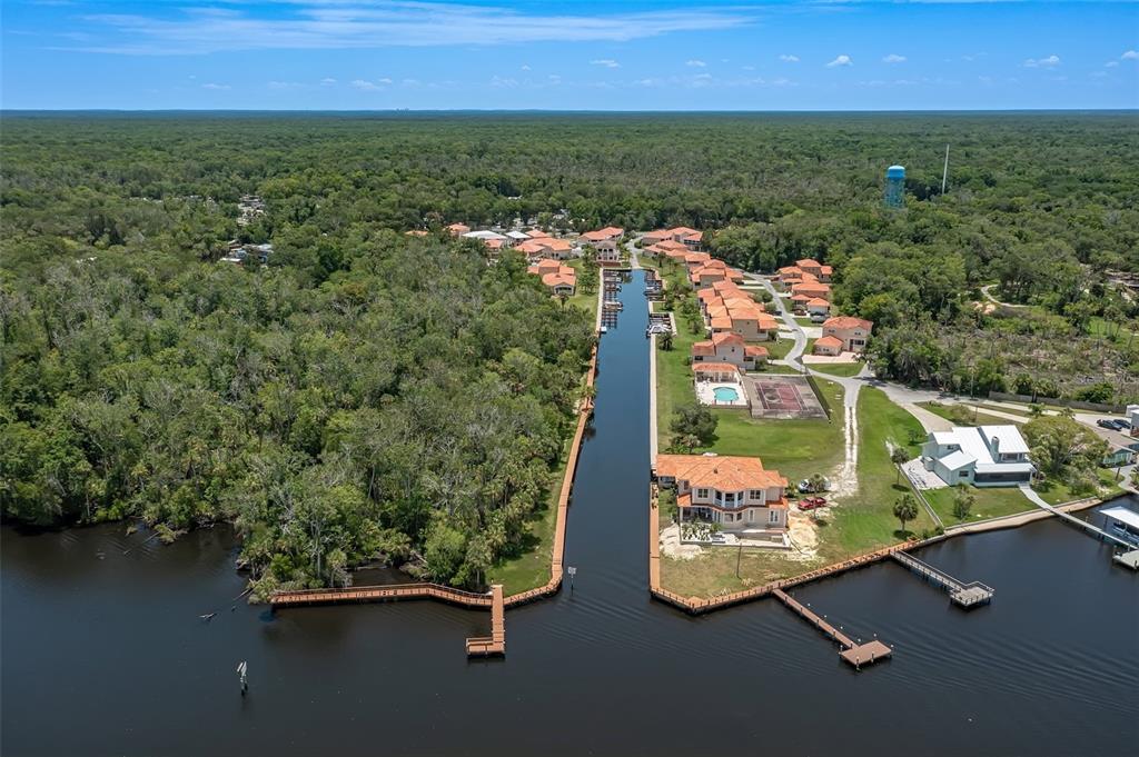 10234 West Middleburg Loop, Unit 152 Homosassa, FL 34448 - Photo 26 of 28 an aerial view of a houses with a yard