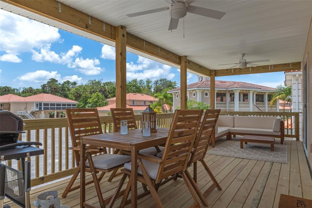 10234 West Middleburg Loop, Unit 152 Homosassa, FL 34448 - Photo 4 of 28 a view of a patio with table and chairs