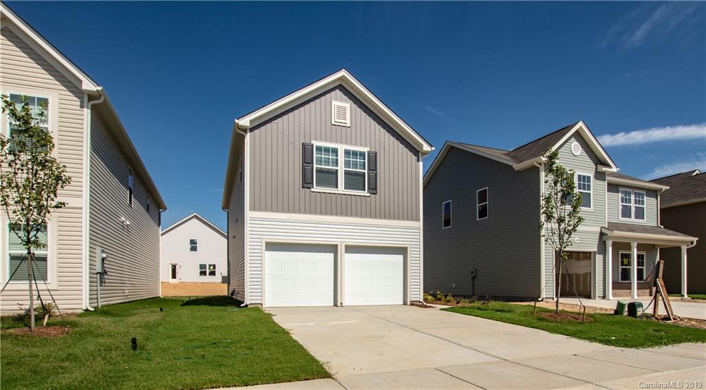 12532 Gotland Road, Unit 331 Midland, NC 28107 - Photo 2 of 26 a front view of a house with a yard
