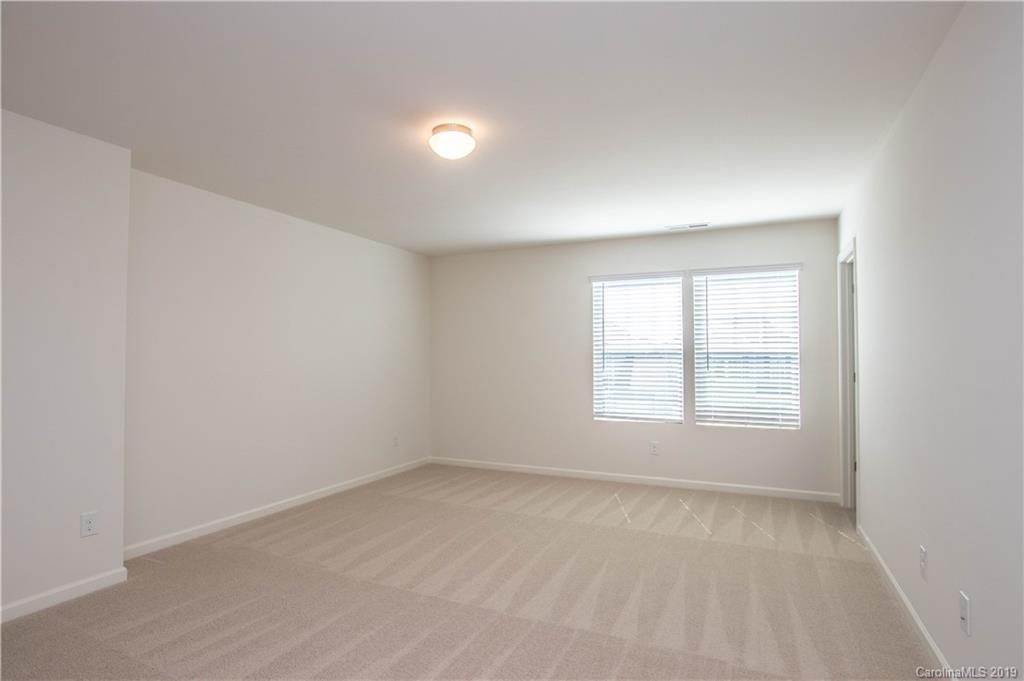 12532 Gotland Road, Unit 331 Midland, NC 28107 - Photo 17 of 26 an empty room with a window