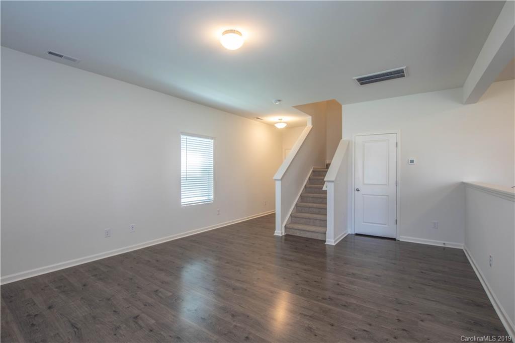 12532 Gotland Road, Unit 331 Midland, NC 28107 - Photo 8 of 26 a view of entryway with wooden floor
