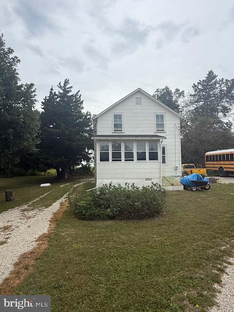 5976 Genoa Avenue Vineland, NJ 08360 - Photo 2 of 6 a front view of a house with garden