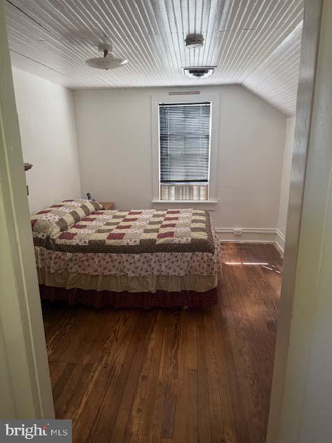 5976 Genoa Avenue Vineland, NJ 08360 - Photo 6 of 6 a bedroom with a bed and a window