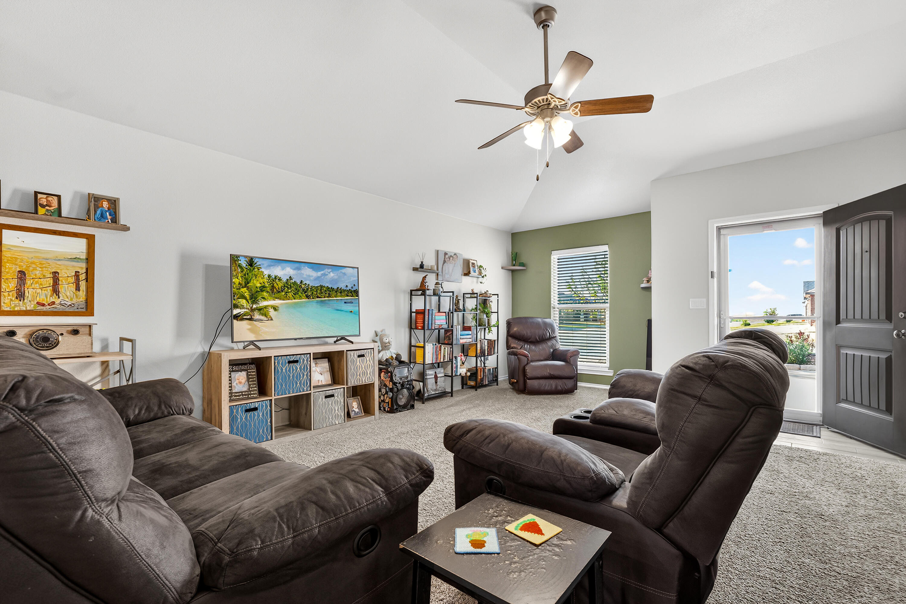 7402 105th Street Lubbock, TX 79424 - Photo 5 of 22 a living room with furniture and a flat screen tv