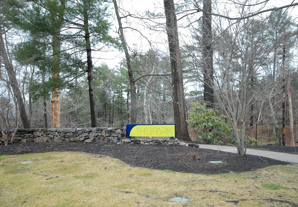 188 Swanson Road, Unit 330 Boxborough, MA 01719 - Photo 18 of 18 a view of a yard with trees