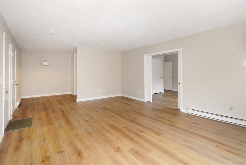 188 Swanson Road, Unit 330 Boxborough, MA 01719 - Photo 3 of 18 wooden floor in an empty room