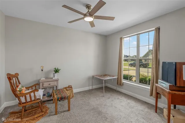 wooden floor in a livingroom with an entryway