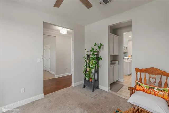 a view of a livingroom with furniture