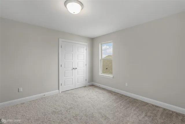 a kitchen with a sink and wooden cabinets