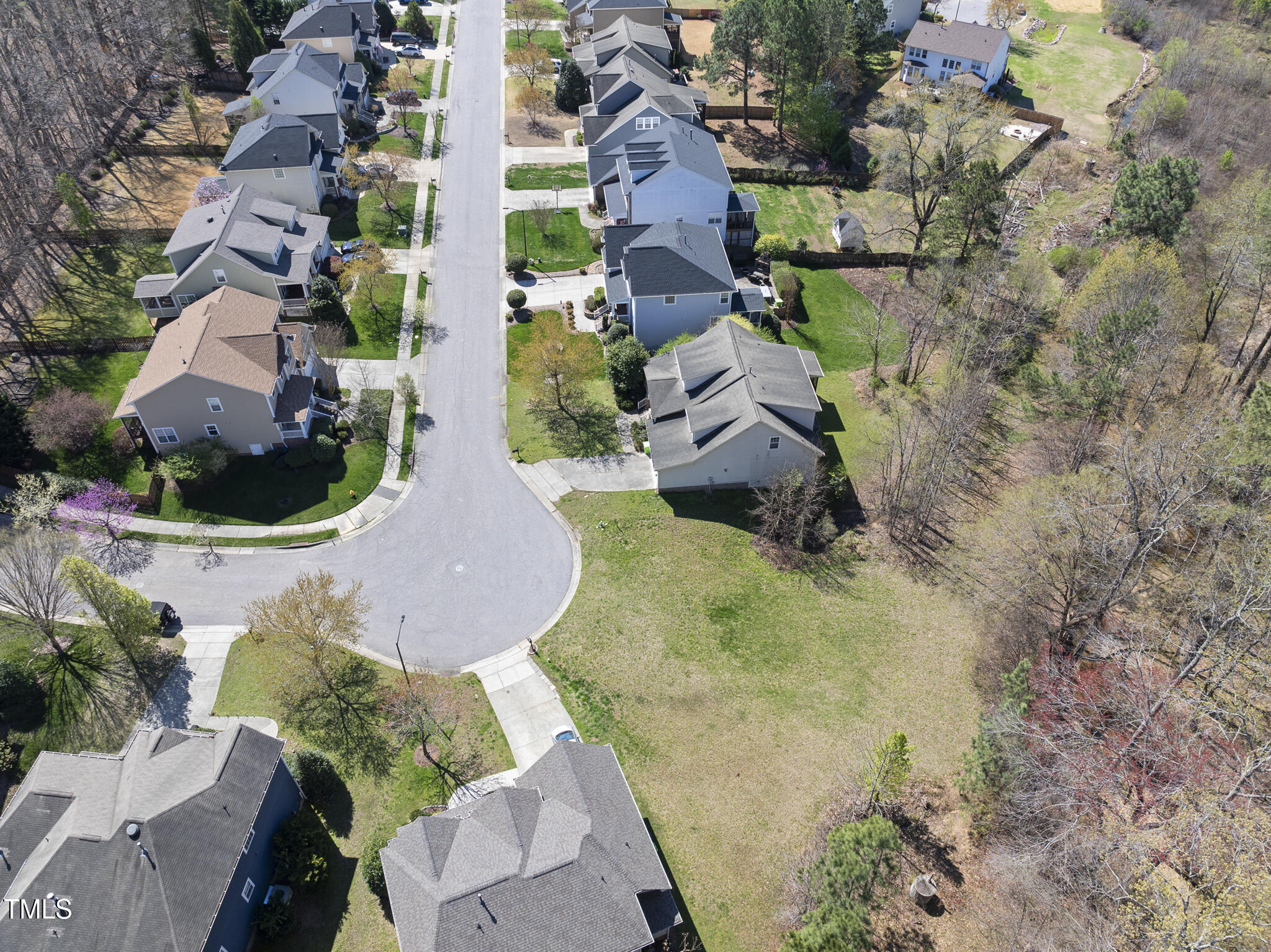 10157 Darling Street Raleigh, NC 27613 - Photo 2 of 5 an aerial view of residential house with outdoor space and swimming pool