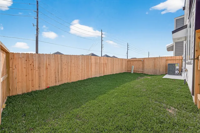 a view of backyard with potted plants