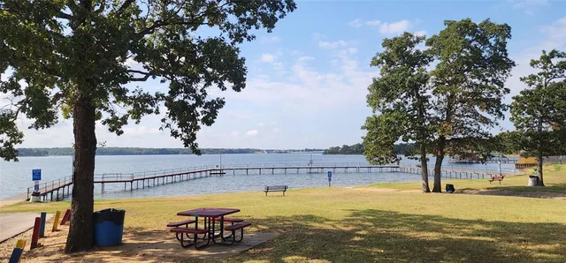 a view of a swimming pool with an ocean view