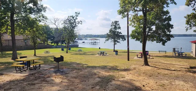 a view of a swimming pool with an outdoor space and seating area