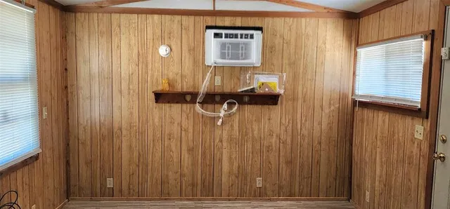 a view of door with wooden door