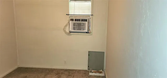 a view of a room with rack on the wall