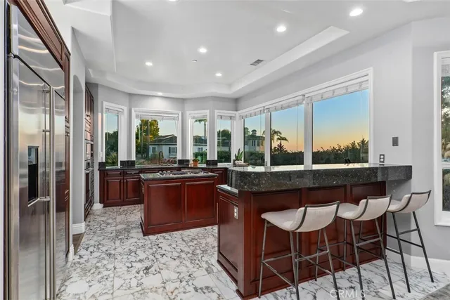 a kitchen with a stove and a sink