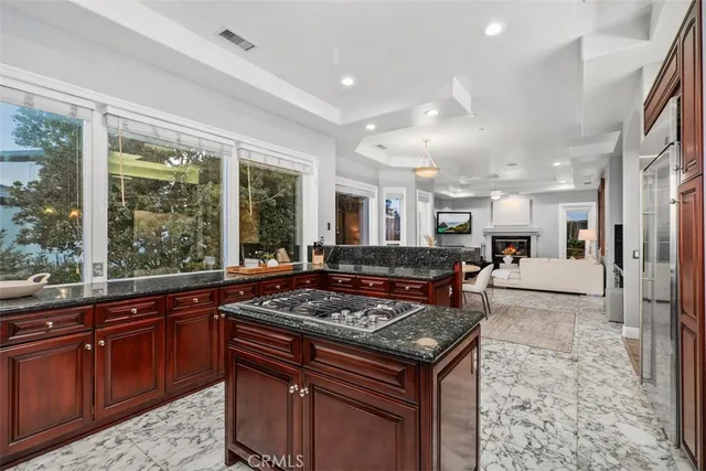 a bedroom with a large bed and a large window