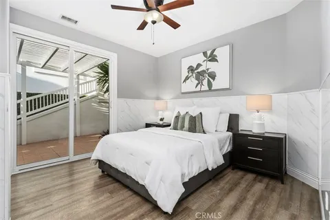 a bathroom with a toilet and shower