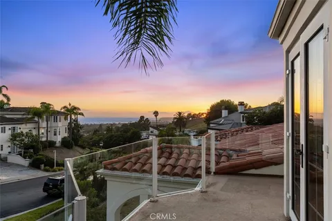 front view of a house with a garden