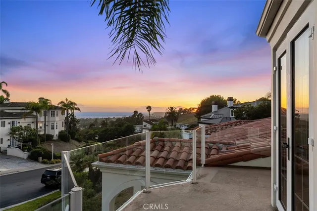 front view of a house with a garden