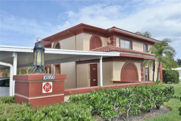 a front view of a house with yard