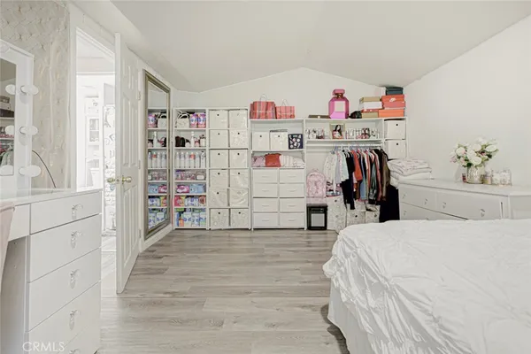 a view of a house with a porch and sitting area