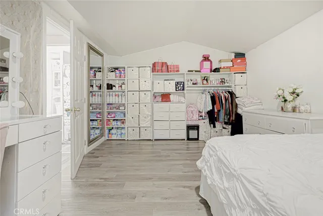 a view of a house with a porch and sitting area