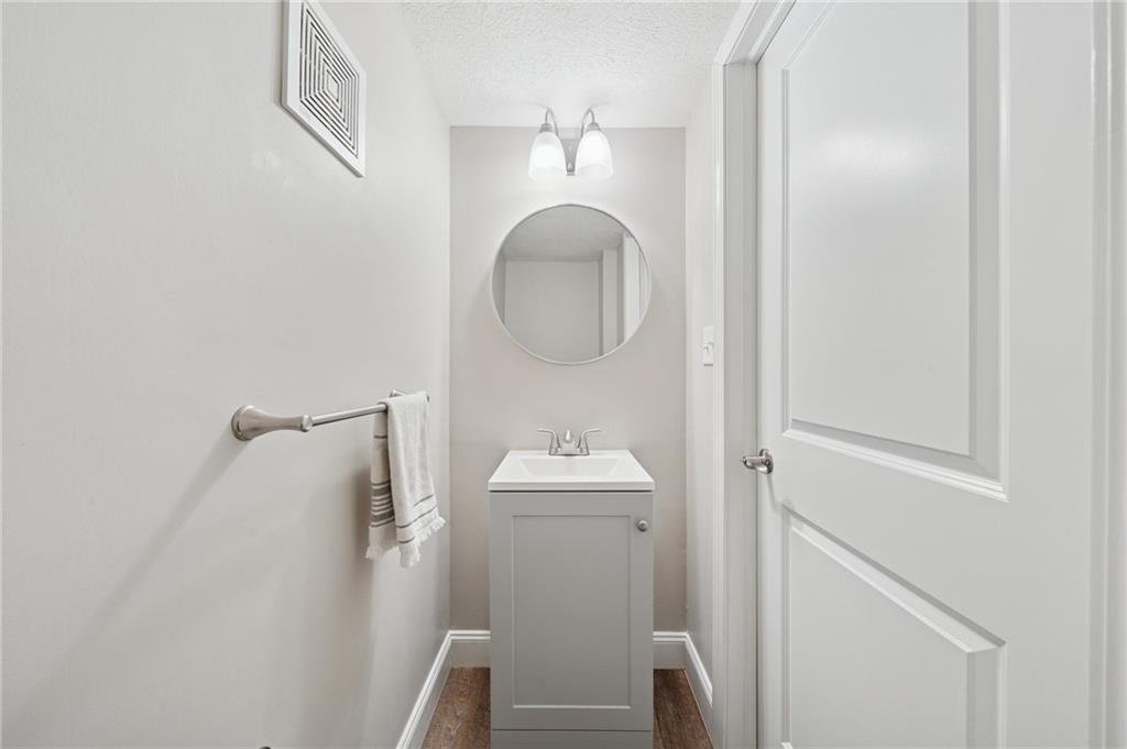 2047 Haymaker Road Monroeville, PA 15146 - Photo 13 of 31 a bathroom with a sink and a mirror