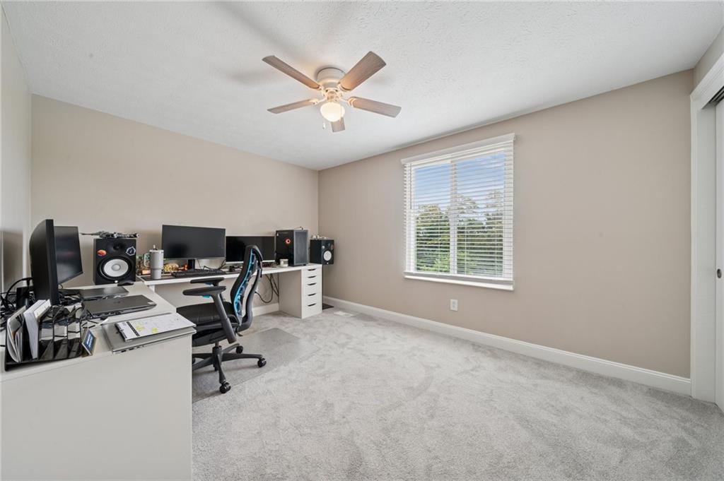 2047 Haymaker Road Monroeville, PA 15146 - Photo 23 of 31 a view of a workspace with furniture and a window