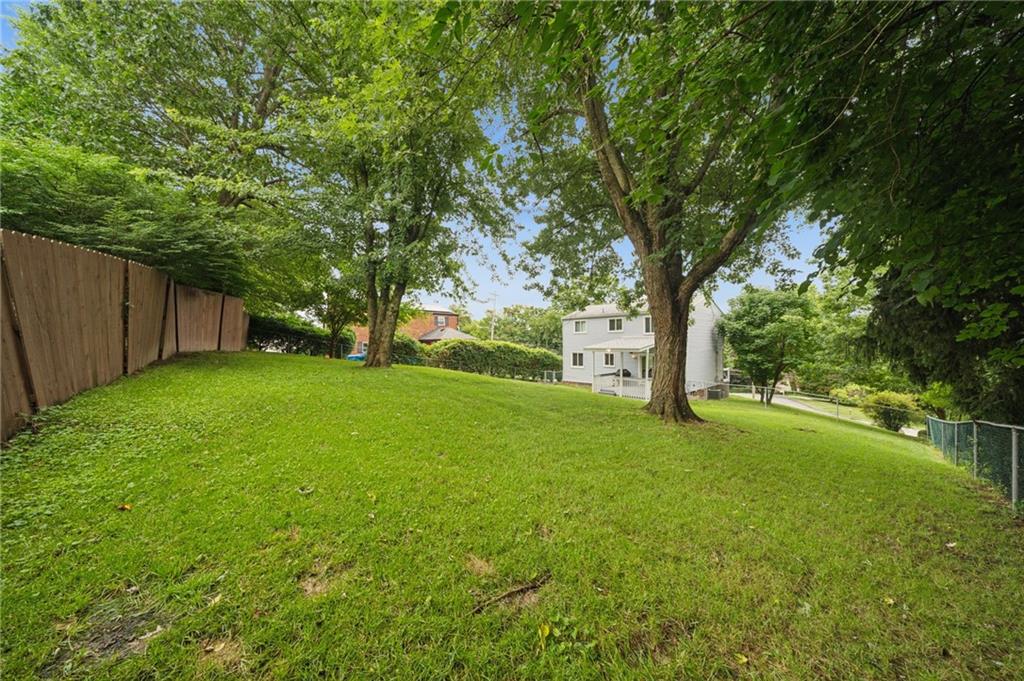 2047 Haymaker Road Monroeville, PA 15146 - Photo 28 of 31 a view of a backyard with large trees