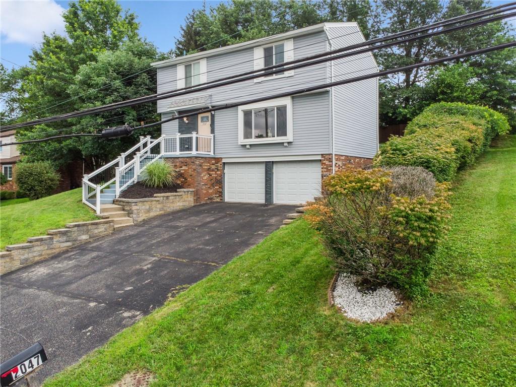 2047 Haymaker Road Monroeville, PA 15146 - Photo 31 of 31 a view of a house with backyard and garden