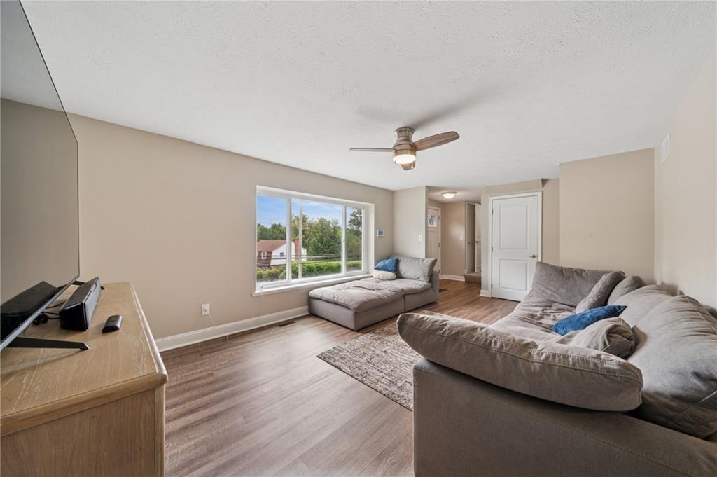 2047 Haymaker Road Monroeville, PA 15146 - Photo 4 of 31 a living room with furniture and a window
