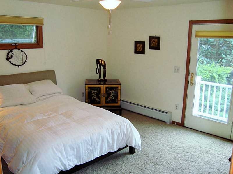 26 Decatur Avenue Jamestown, RI 02835 - Photo 12 of 20 Bedroom. Master with doors to the deck and a private bath