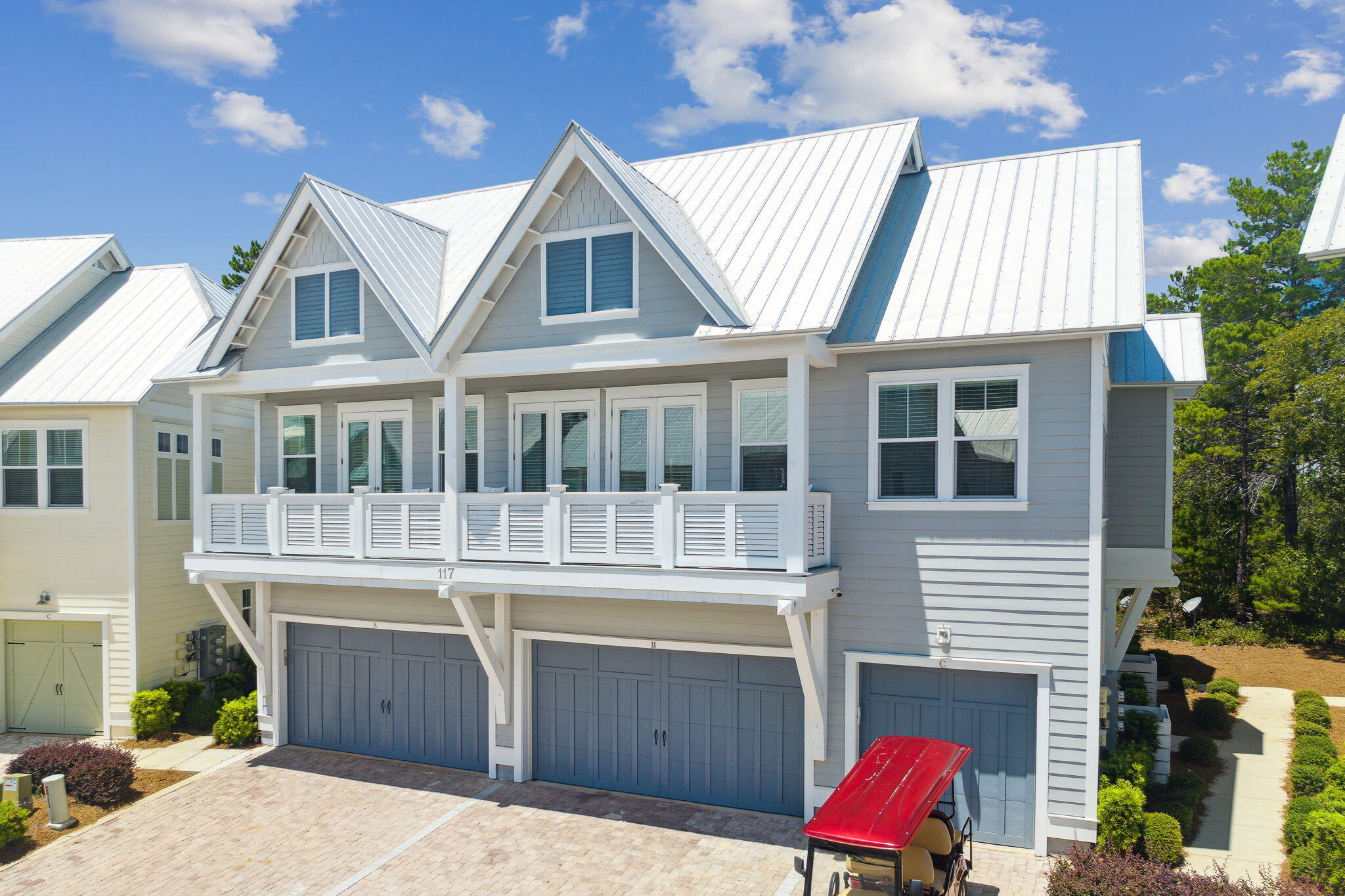 117 West W Pine, Unit C Inlet Beach, FL 32461 - Photo 26 of 45 a front view of a house with a yard