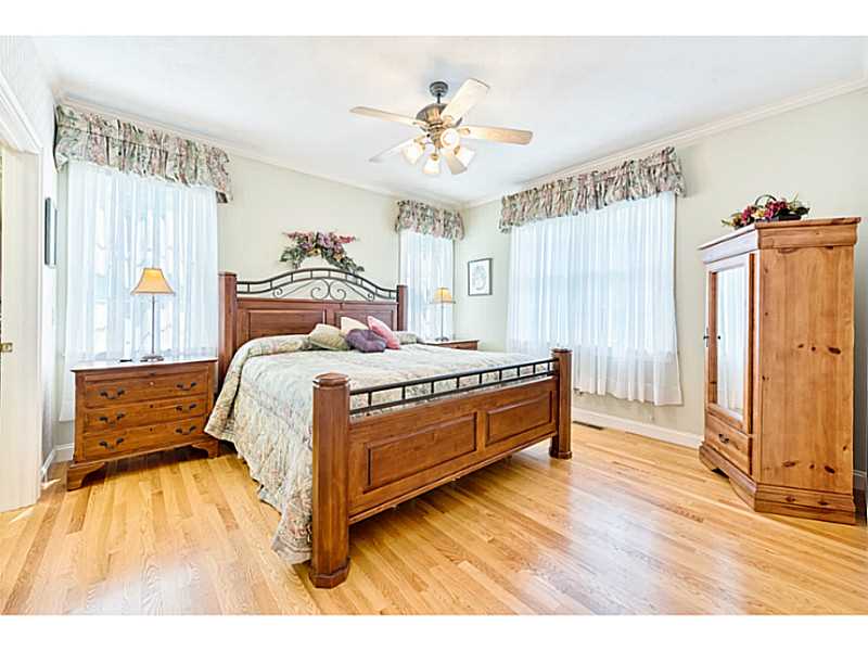 168 Kingston Road Exeter, RI 02822 - Photo 20 of 25 Master Bedroom. Master bedroom on the first floor of the in-law/guest area with large walkin closet and ensuite master bath. There is another bedroom on this floor as well, not pictured in MLS due to space.