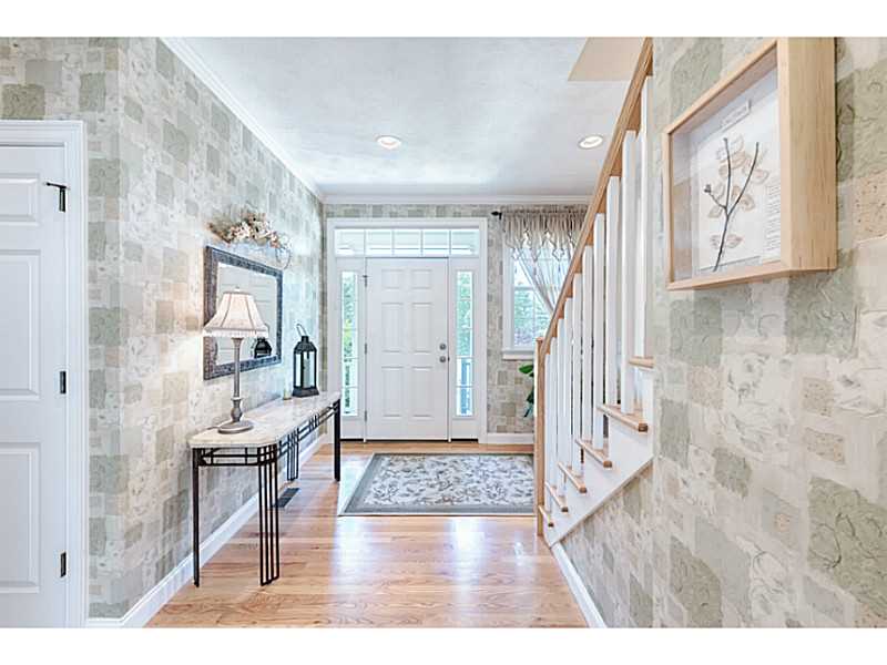 168 Kingston Road Exeter, RI 02822 - Photo 8 of 25 Entry. Entry foyer of the main house. Beautiful hardwood floors and transom window lets in extra light.