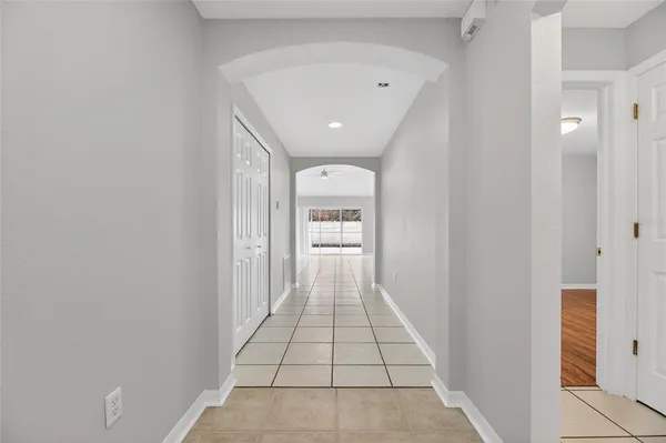 a view of a kitchen with a sink and a fireplace