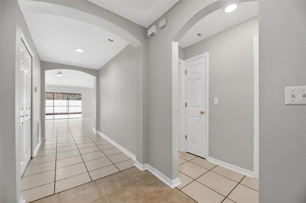 a view of a kitchen with a sink and a microwave