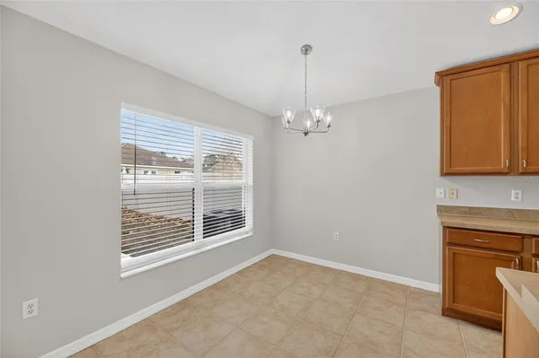 a kitchen with stainless steel appliances granite countertop a stove top oven a sink and dishwasher