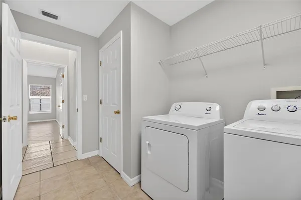 a bathroom with a sink double vanity and a mirror